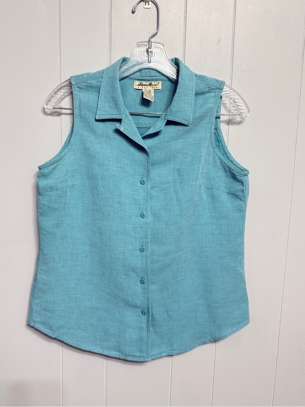 #14) Eddie Bauer Sleeveless Button-Down Top in Seafoam Blue
